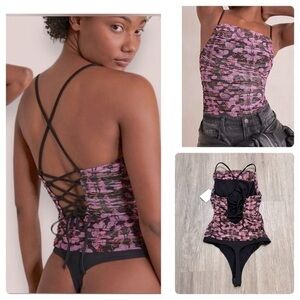 NWT FREE PEOPLE pretty Milkshake Mess lace up sleeveless bodysuit.